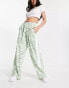 ASOS DESIGN pull on trouser with contrast panel in animal print in sage