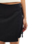 Pieces wrap front mini skirt in black