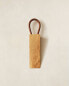 Wooden leather doorstop