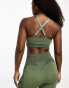 Hummel Seamless mesh insert sports crop top in dark green