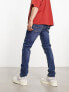 Jack & Jones Intelligence glenn slim fit jean in mid blue wash with abrasions