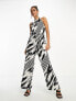 River Island halterneck tie back wide leg jumpsuit in black and white