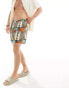 ASOS DESIGN swim shorts in mid length in bright patchwork print