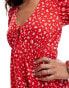 Monki mini dress with puff sleeves and tie front in red ditsy print