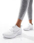 Nike Running Interact Run trainers in white and silver