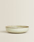 Porcelain soup plate with antique finish rim