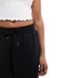 Monki joggers with cuffed hem in black