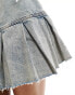 Monki low waist denim skirt with pleat raw hem in tinted blue wash