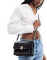 Accessorize crossbody bag with gold clasp in black