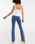 Topshop flare jeans in mid wash blue