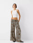 Bershka tie waist wide leg trousers in leopard print