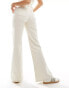 & Other Stories stretch high waist flared leg jeans with double belt loop detail and patch pockets in off white