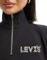 Levi's exclusive to ASOS half zip jumper in black with small leopard print logo