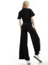 ASOS DESIGN ruched side jumpsuit with wide leg in black