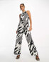 River Island halterneck tie back wide leg jumpsuit in black and white