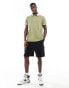 Tommy Hilfiger garment dye regular polo in olive green