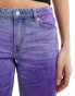 Monki Imoo low waisted wide fit jeans in rainbow colour wash