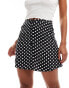 Miss Selfridge button through flippy mini skirt in black polka dot