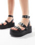 ASOS DESIGN Wide Fit Trombone chunky buckle detail flatforms in black