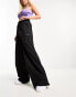 Nicce alia wide leg cargo trousers in black with side hem split