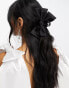 True Decadence bow hair claw in black