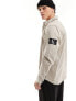 Calvin Klein Jeans monogram logo badge relaxed shirt in taupe