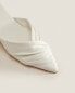 Slippers with pleated details