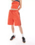 COLLUSION oversized longline sports short in red