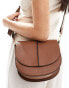 Accessorize crossbody bag with white stitching in tan