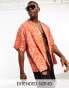 ASOS DESIGN boxy oversized revere shirt in orange scribble floral print