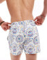 ASOS DESIGN swim shorts in short length in paisley print in off white