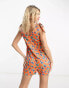 Wednesday's Girl button through floral print romper suit in orange