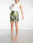 Something New x Lame. Cobain metallic button front mini skirt in green