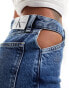 Calvin Klein Slim Straight Cut Out Jeans in denim