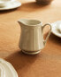 Porcelain milk jug