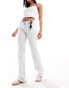 Monki Wakumi low waisted boot cut jeans in light bleach blue wash