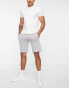 FCUK side scribble jersey shorts in light grey