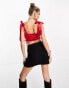 Saint Genies satin corset crop top with bunny tie in red