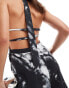 ASOS DESIGN halter neck tie detail wide leg jumpsuit in abstract print