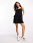 ASOS DESIGN Petite denim pinny dress in black