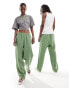 Weekday Unisex Seth linen trousers in green exclusive to ASOS