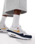 Nike Air Max 1 SC trainers in white, navy and gold