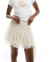 ASOS DESIGN asymmetric hem lace mini skirt with ruched waist in ivory