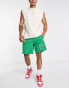 The Couture Club co-ord mesh varsity shorts in green with racer print