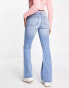 Miss Selfridge low rise raw waistband flare jean in mid wash blue