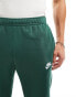 Nike Club straight fit joggers in green