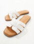 Truffle Collection wide fit flat mule in white