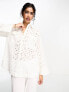 ASOS DESIGN relaxed broderie shirt with dipped hem in white