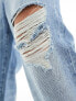 ASOS DESIGN baggy jeans with with rips in mid wash blue