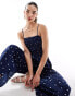 Wednesday's Girl polka dot smocked jumpsuit in navy and cream